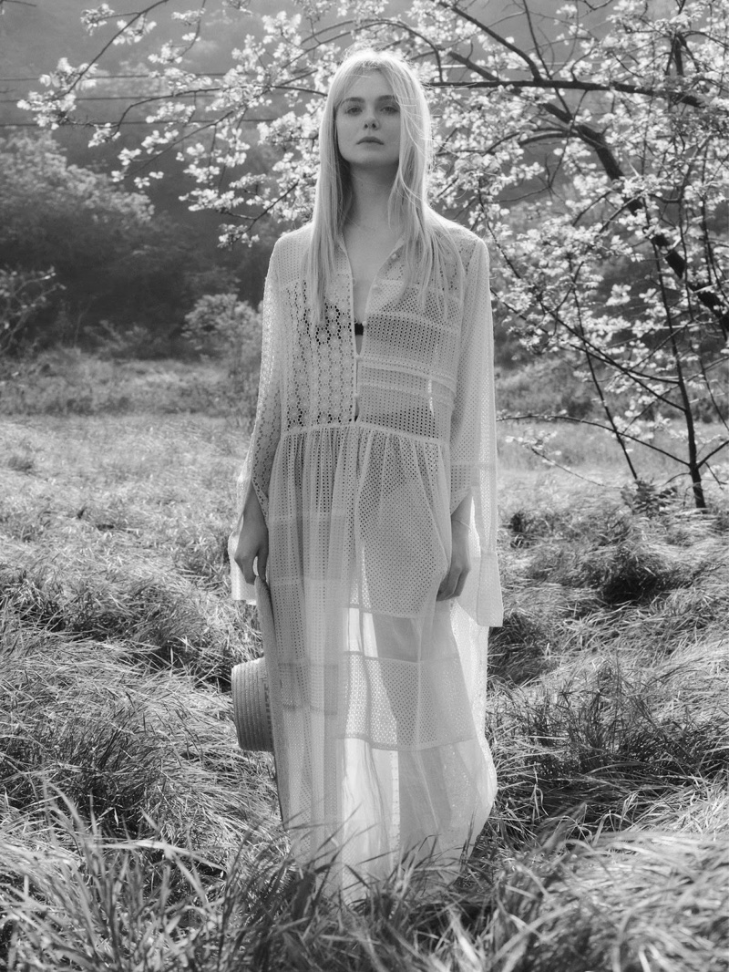 Elle Fanning wears white Joseph maxi dress