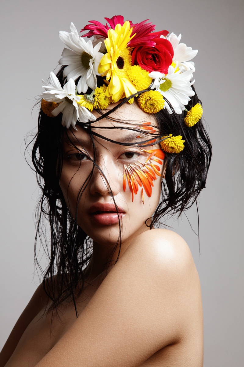 Jessie Li models floral blooms. Photo: Jeff Tse