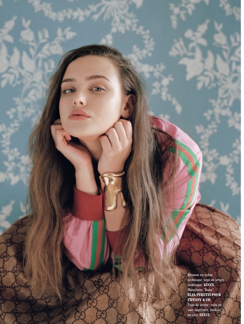 Actress Katherine Langford wears Gucci blouson and skirt