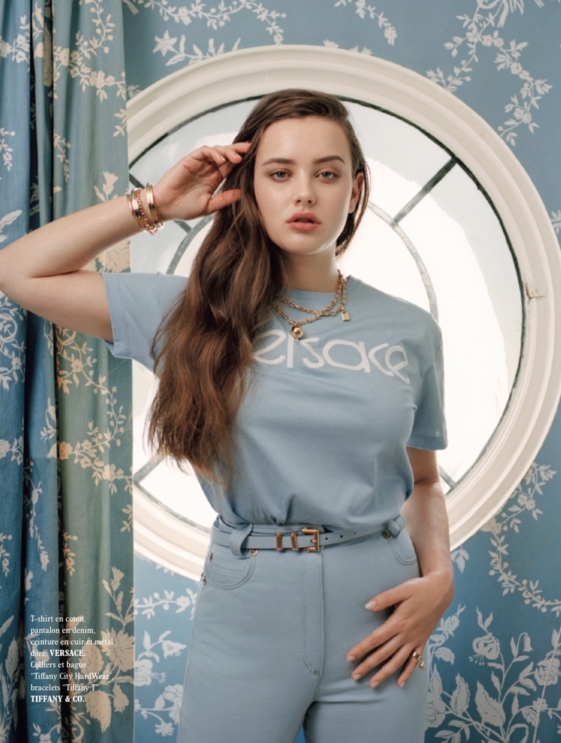 Actress Katherine Langford wears Versace t-shirt and jeans with Tiffany & Co. jewelry