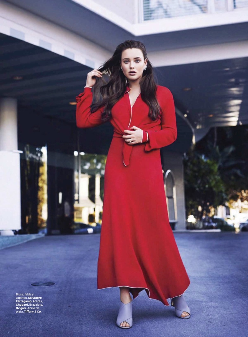 A lady in red, Katherine Langford wears Salvatore Ferragamo blouse, skirt and sandals