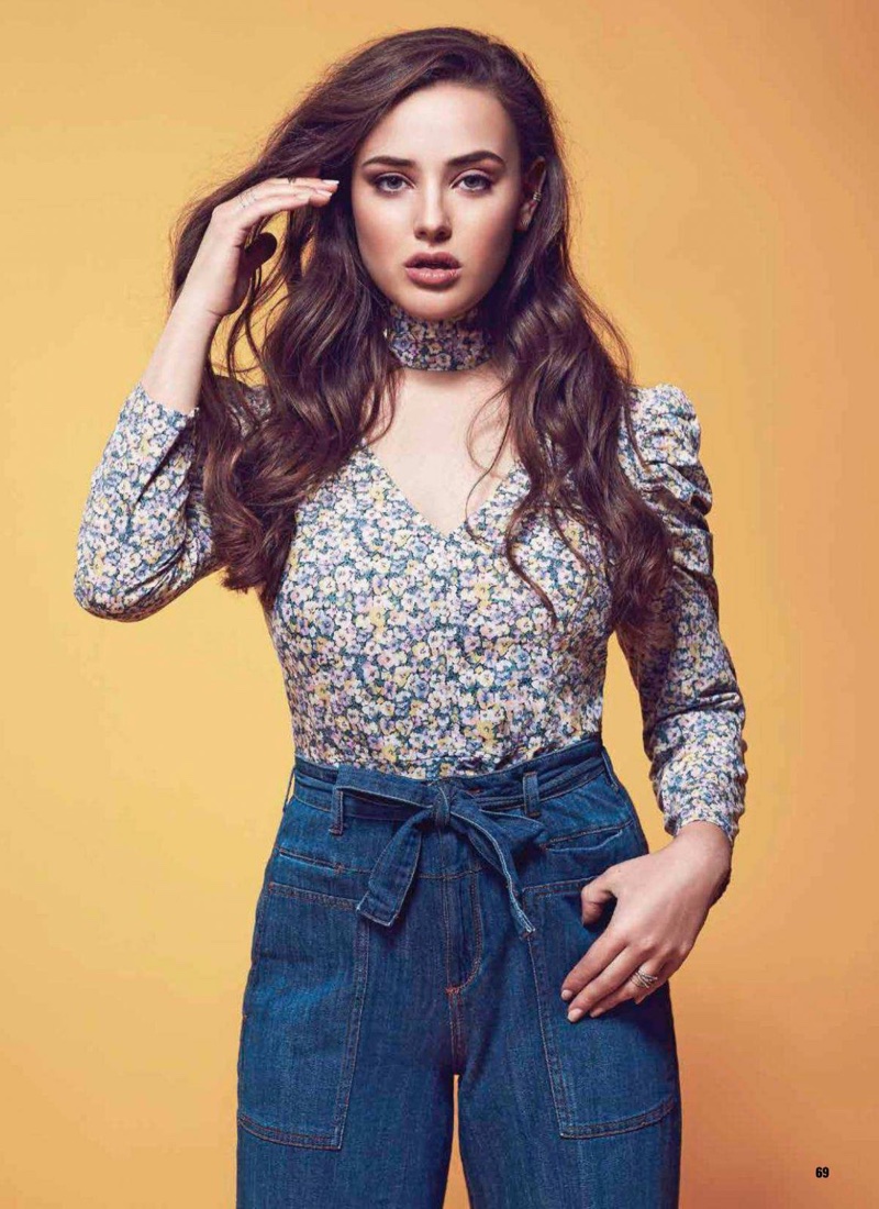 Embracing floral, Katherine Langford poses in high-waist denim