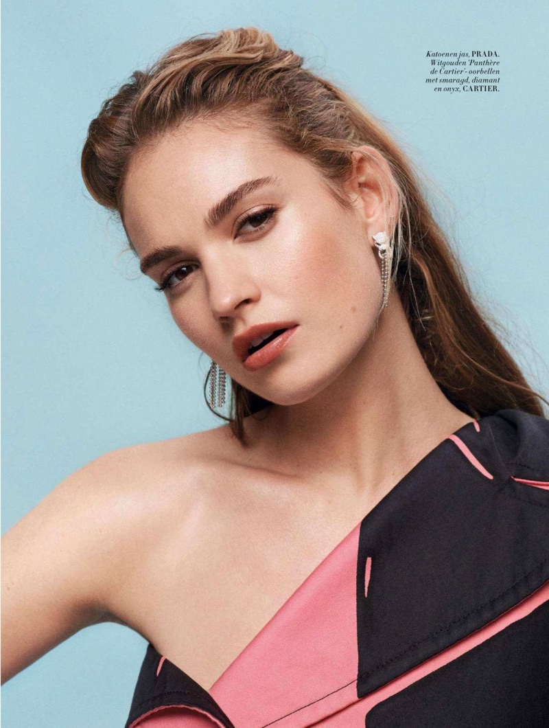 Ready for her closeup, Lily James poses in Prada jacket and Cartier earrings