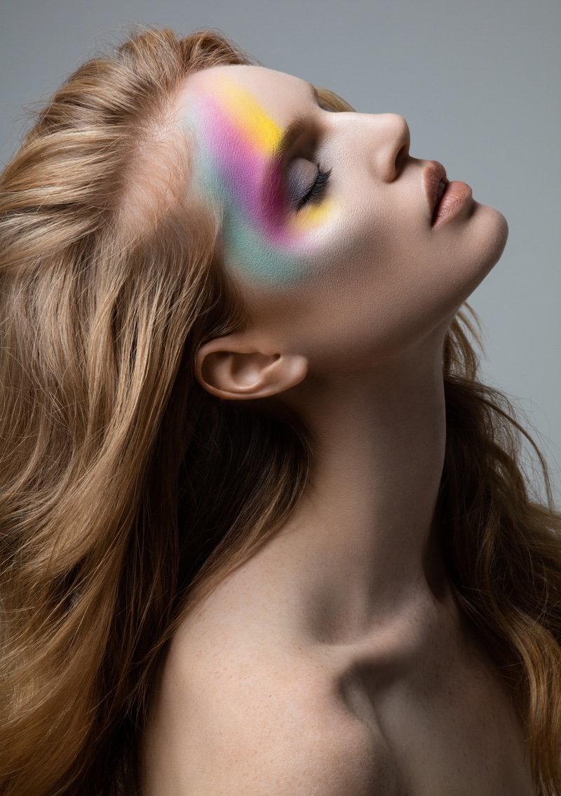 Nell Rebowe poses in rainbow makeup. Photo: Jeff Tse