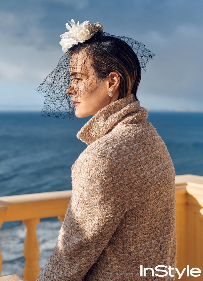 Actress Sarah Paulson wears Chanel Haute Couture coat and veil as well as Tiffany & Co. earrings