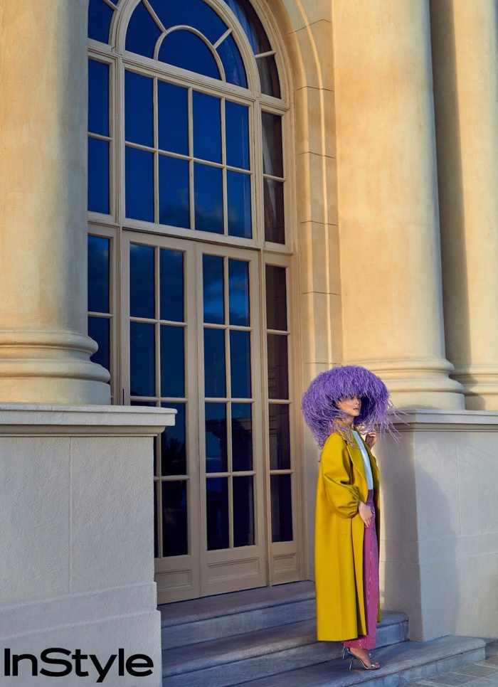 Sarah Paulson poses in Valentino Haute Couture cape, top, pants and sandals