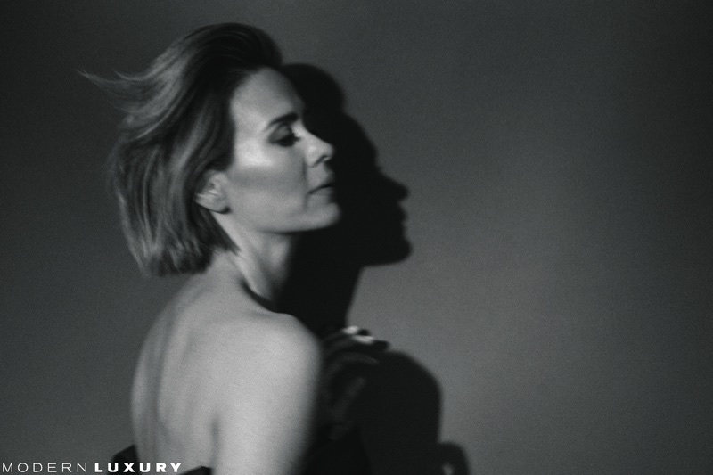 Photographed in black and white, Sarah Paulson wears Versace gown