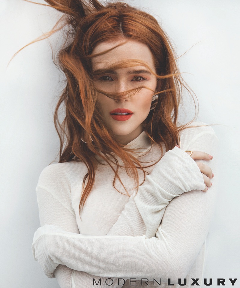 Actress Zoey Deutch wears Nanushka turtleneck top