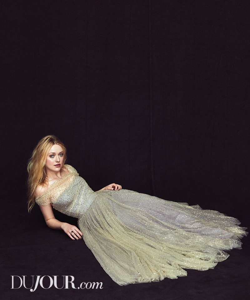 Dakota Fanning poses in Dior gown with John Hardy ring