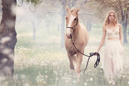 Ermanno Scervino Sets Dreamy Fall 2018 Campaign in Tuscany Kirin Dejonckheere poses with a horse in Ermanno Scervino's fall-winter 2018 campaign