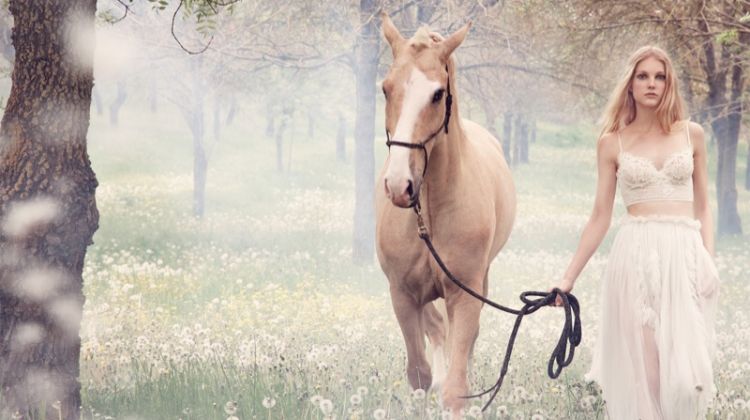 Kirin Dejonckheere poses with a horse in Ermanno Scervino's fall-winter 2018 campaign
