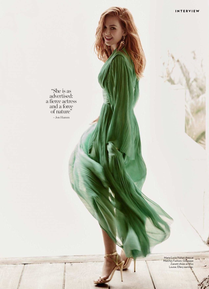 Dressed in green, Isla Fisher wears Maria Lucia Hohan dress and Giuseppe Zanotti heels