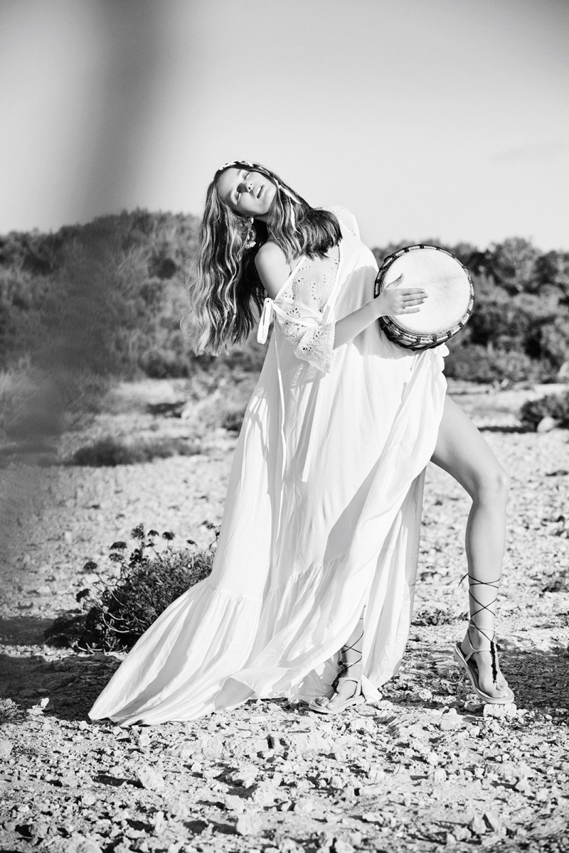 Kristina Romanova Wears the Season's Prettiest Dresses for ELLE Russia