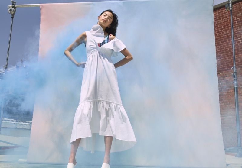 Xiao Wen Ju models white dress in La Ligne's summer 2018 campaign