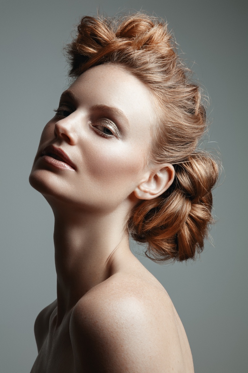 Model Georgie Wass wears a polished updo hairstyle. Photo: Jeff Tse