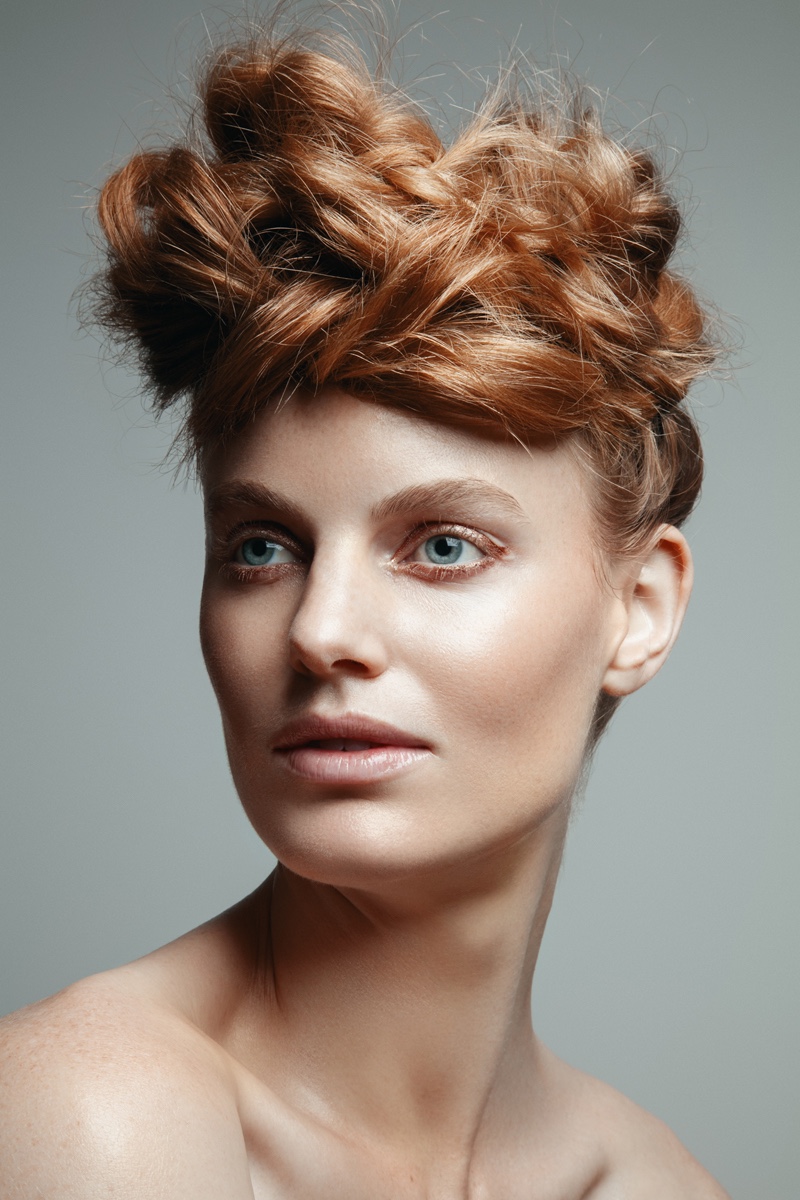 Georgie Wass models a chic updo hairstyle. Photo: Jeff Tse