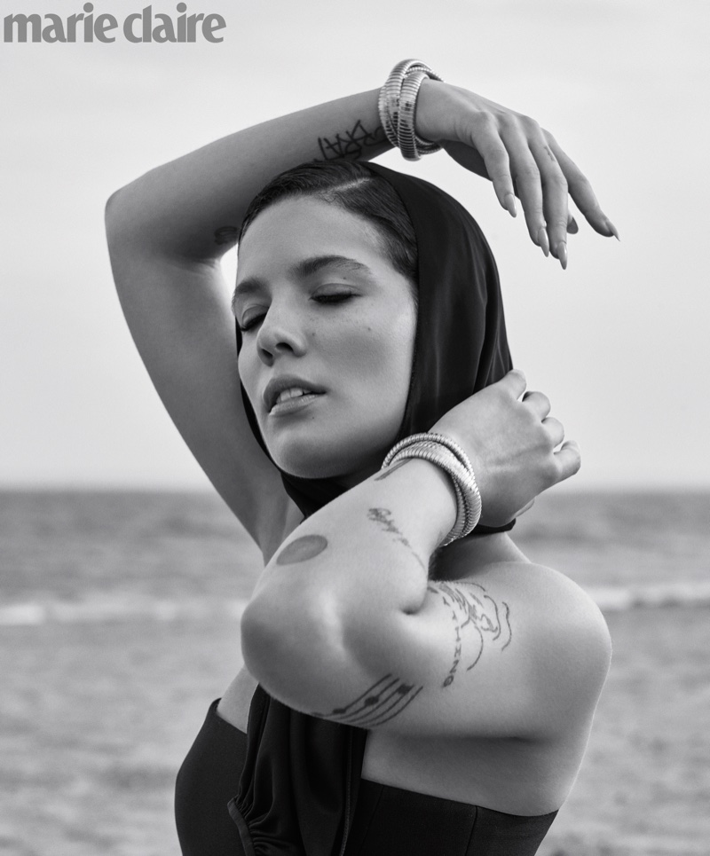 Posing at the beach, Halsey wears Versace dress and scarf with Sidney Garber bracelets