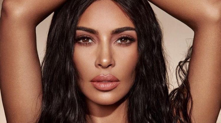 Kim Kardashian shows off a wavy hairstyle for KKW Beauty Classic Collection campaign