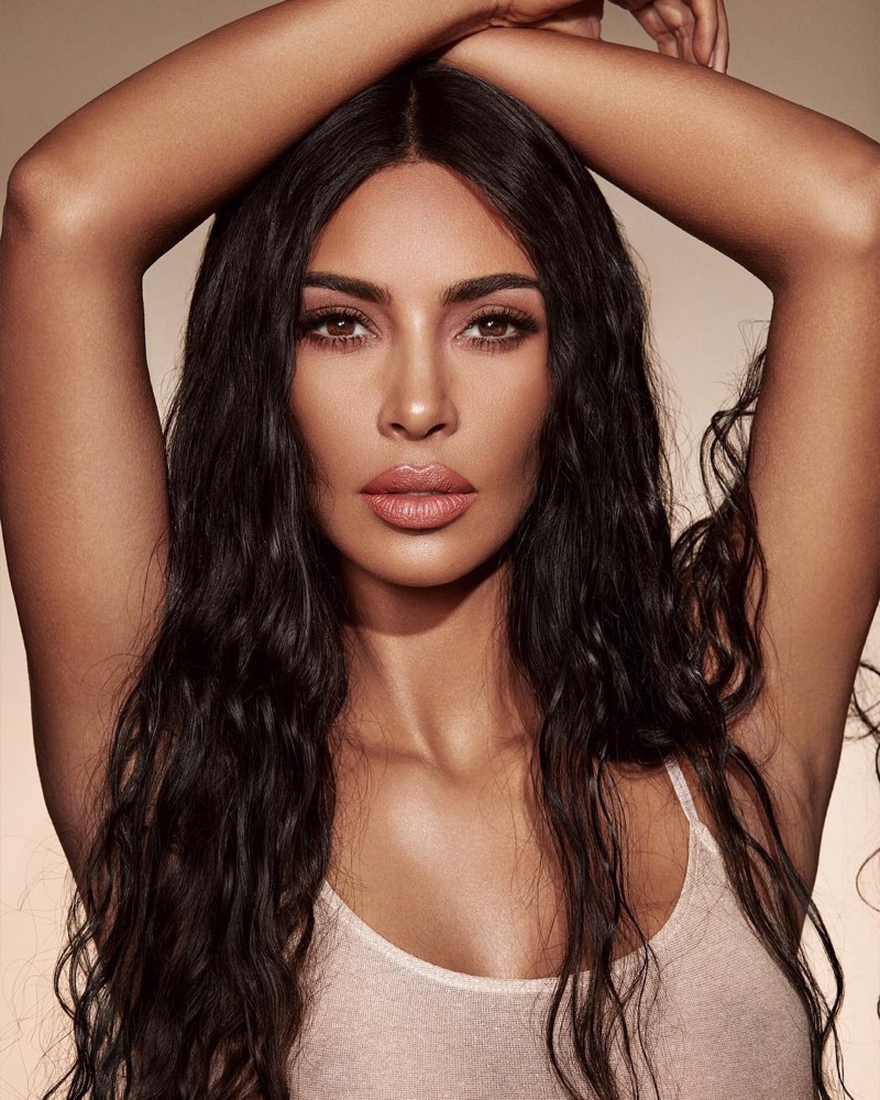 Kim Kardashian shows off a wavy hairstyle for KKW Beauty Classic Collection campaign