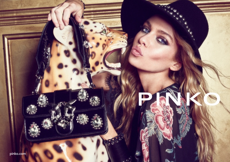 Stella Maxwell poses with a leopard in Pinko fall-winter 2018 campaign