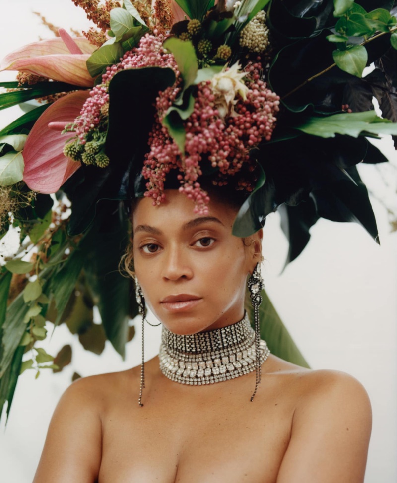 Singer Beyonce wears Phil John Perry for Rebel Rebel floral headdress, Erickson Beamon earrings and Lynn Ban necklaces