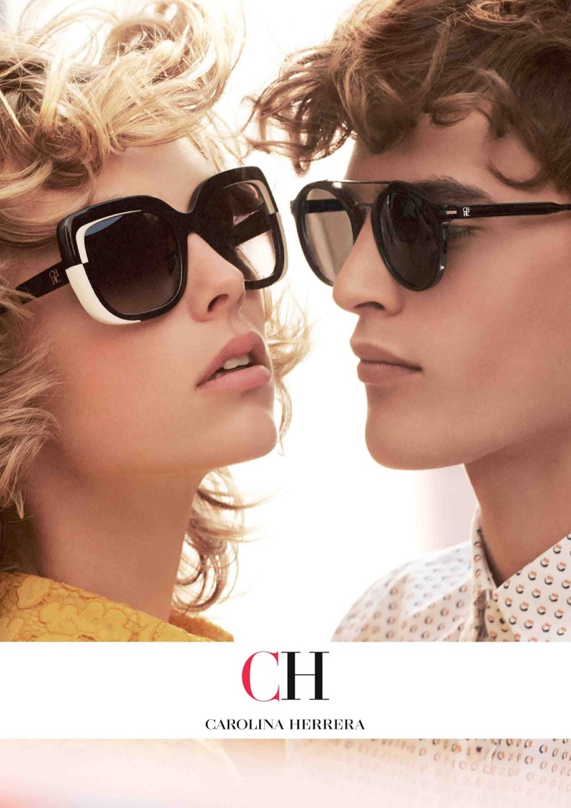 Edie Campbell and Parker van Noord wear sunglasses in Carolina Herrera fall-winter 2018 campaign