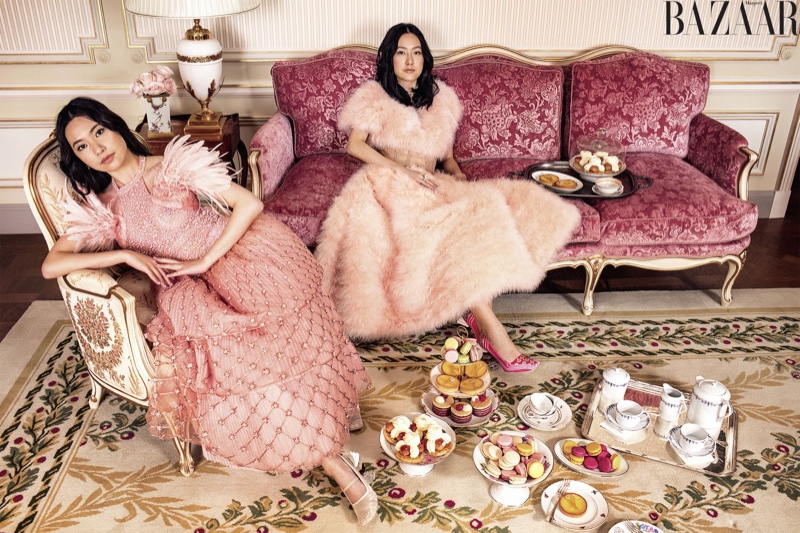 Rachel and Michelle Yeoh pose in Fendi Couture dresses and shoes with Cartier jewelry
