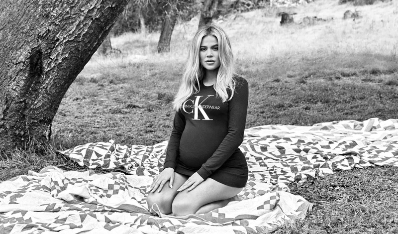 Pregnant Khloe Kardahsian poses for Calvin Klein Jeans fall 2018 campaign