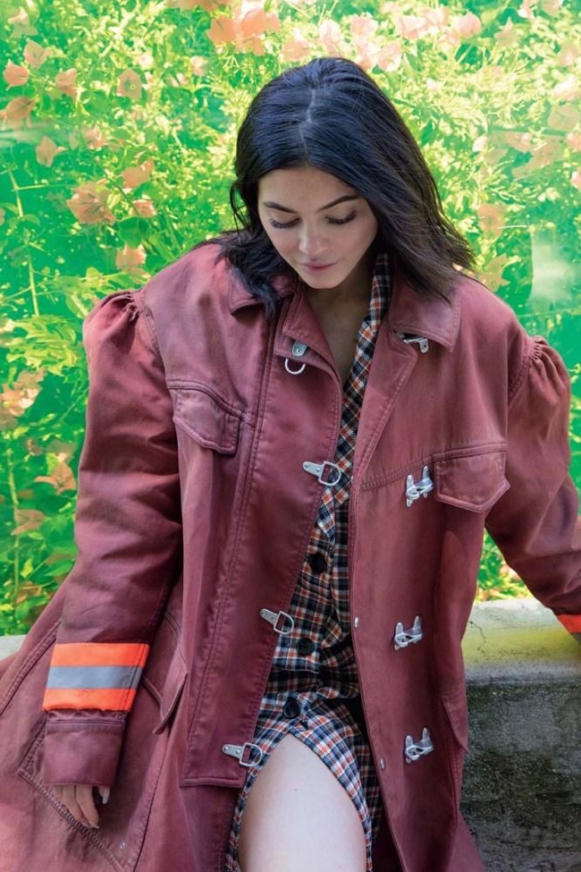 Posing in Calvin Klein, Kylie Jenner wears jacket and plaid shirt