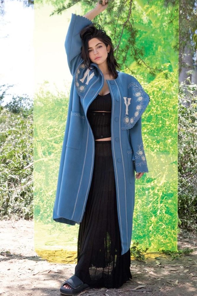 Kylie Jenner poses in Gucci coat