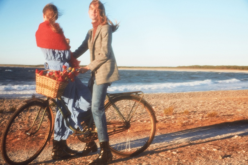 Posing on a bike, Rianne van Rompaey fronts Massimo Dutti fall-winter 2018 campaign