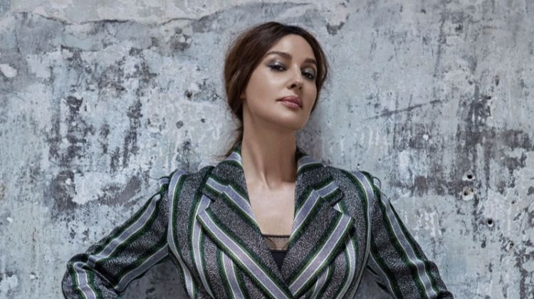 Striking a pose, Monica Bellucci wears Emporio Armani dress and Eres bodysuit