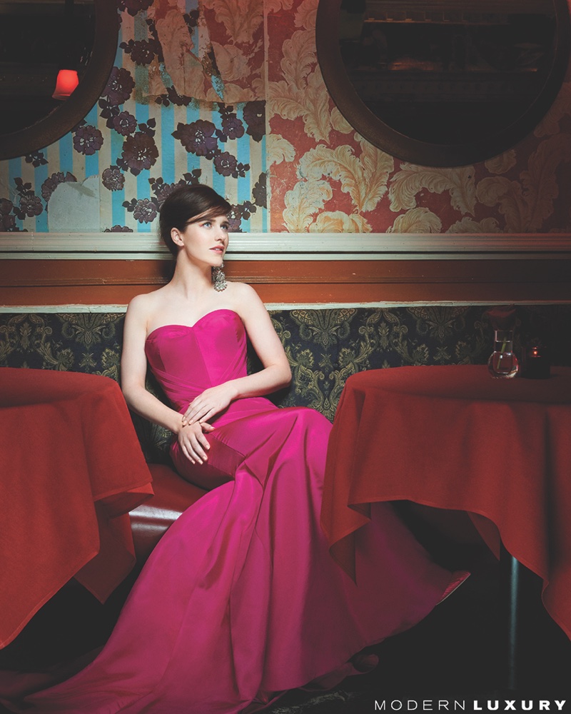 Rachel Brosnahan poses in Zac Posen gown and Tom Ford earrings