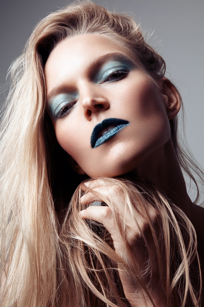 Sarah DeAnna shows off bold eyeshadow and lipstick. Photo: Jeff Tse