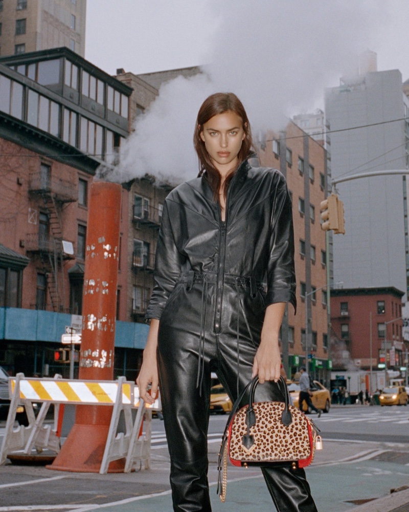 Model Irina Shayk poses with the Irina bag from The Kooples