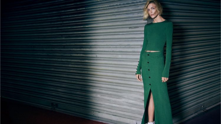 Anja Rubik models Zara green ribbed top and skirt with white ankle boots