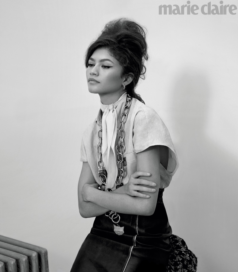 Photographed in black and white, Zendaya poses in Miu Miu top, skirt, scarf and necklace