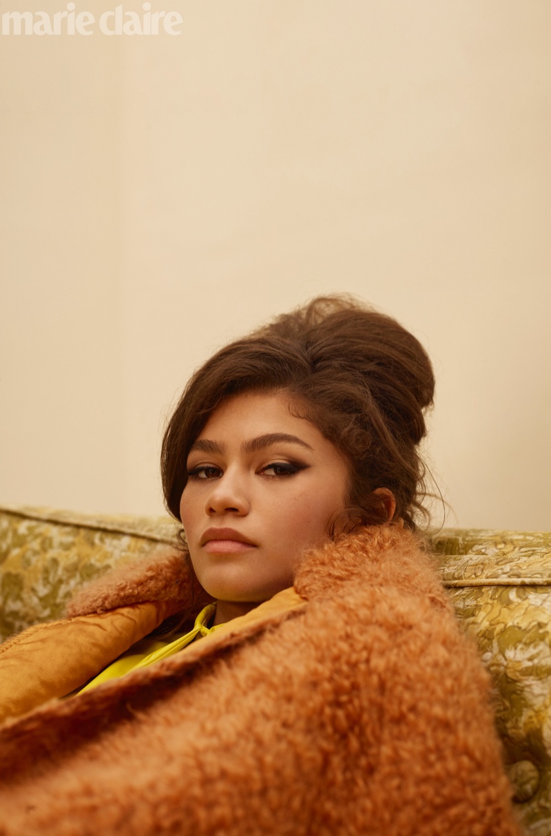 Actress Zendaya poses in Bottega Veneta jacket and No. 21 top