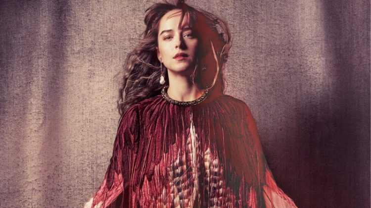 Actress Dakota Johnson wears Alexander McQueen cape, antique earring and choker necklace