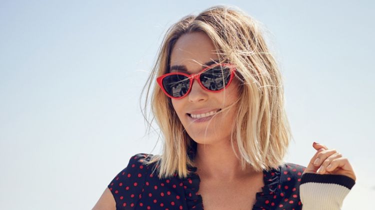 Designer Lauren Conrad poses in Rouje dress, Navy Days cardigan and LC Lauren Conrad Sunglasses