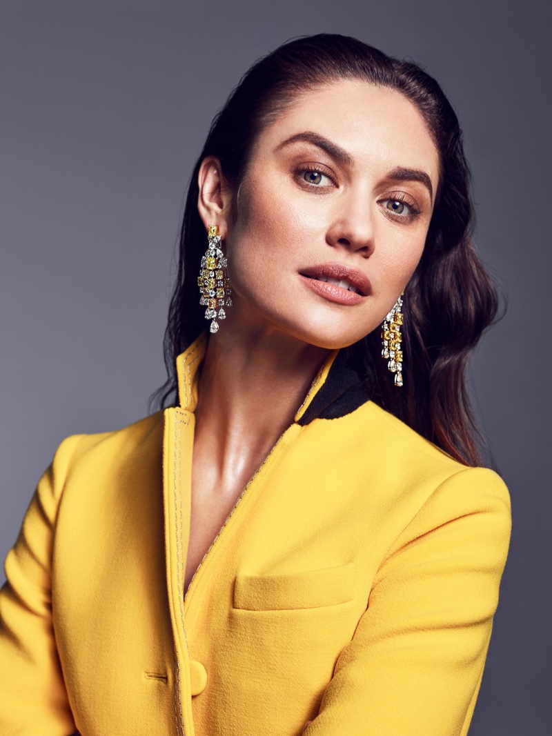 Olga Kurylenko poses in Graff yellow and white diamond earrings