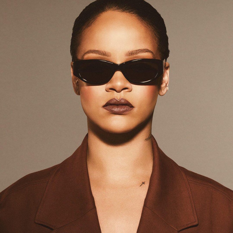 Singer Rihanna wears Fenty Beauty Stunna Lip Paint in Unveil