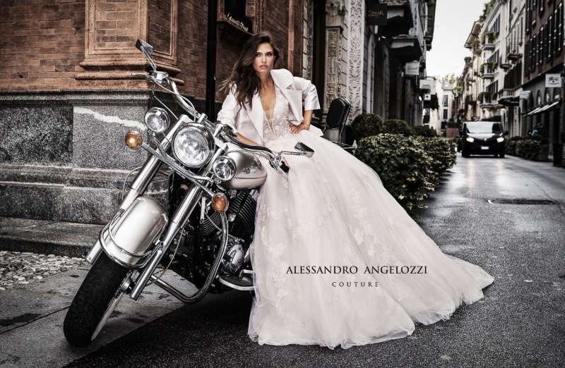 Bianca Balti poses with a motorcycle for Alessandro Angelozzi Couture 2019 Bridal collection campaign