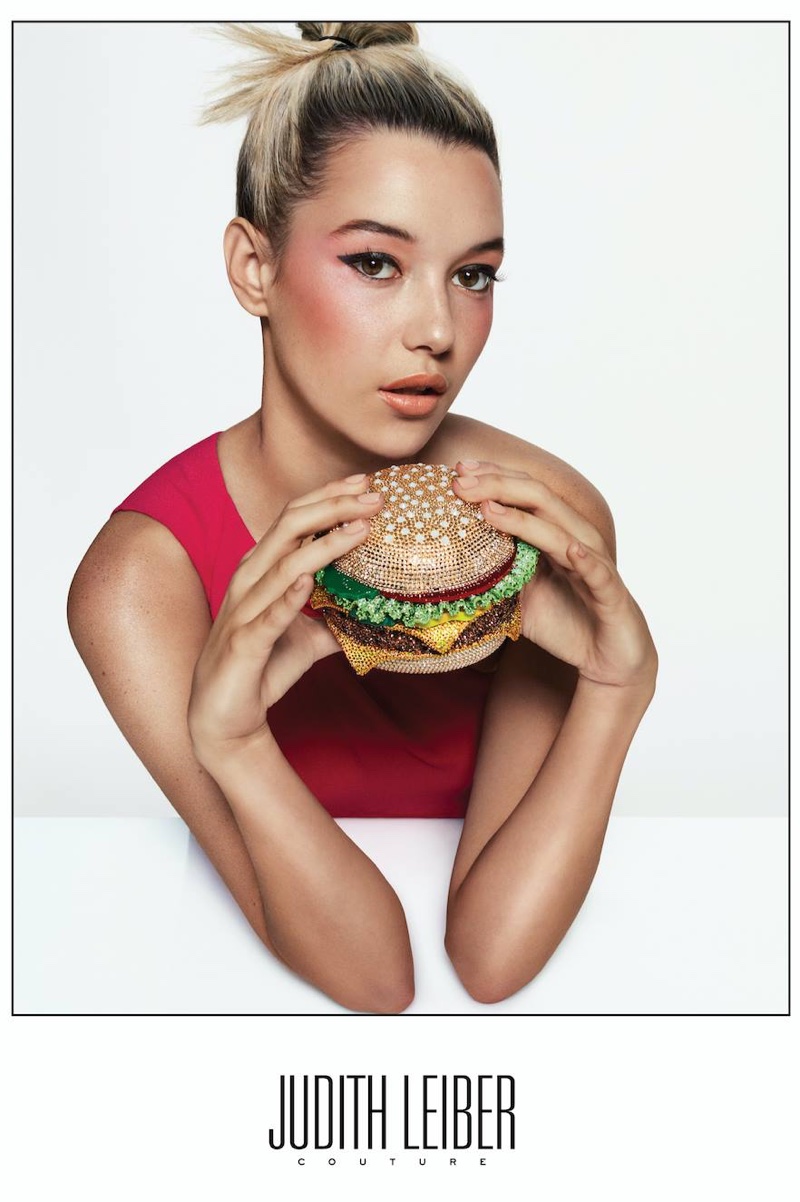 Sarah Snyder poses with hamburger purse for Judith Leiber fall-winter 2018 campaign