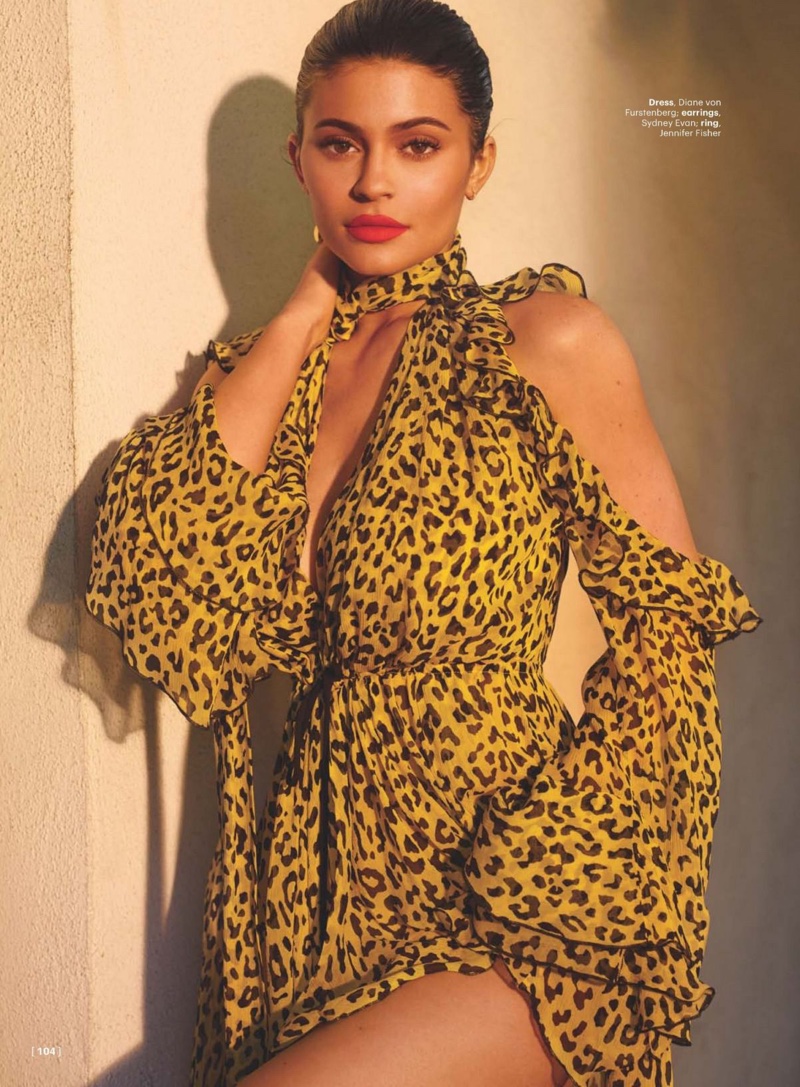 Wearing leopard print, Kylie Jenner poses in Diane von Furstenberg dress