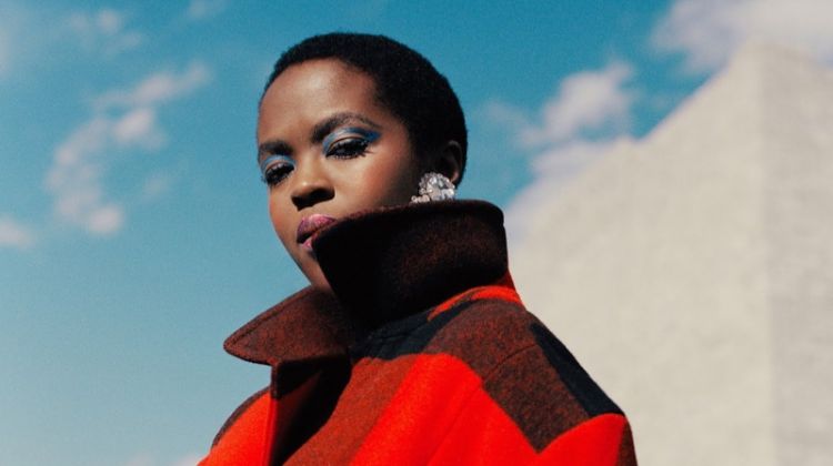 Singer Lauryn Hill poses in buffalo plaid coat for Woolrich fall-winter 2018 campaign