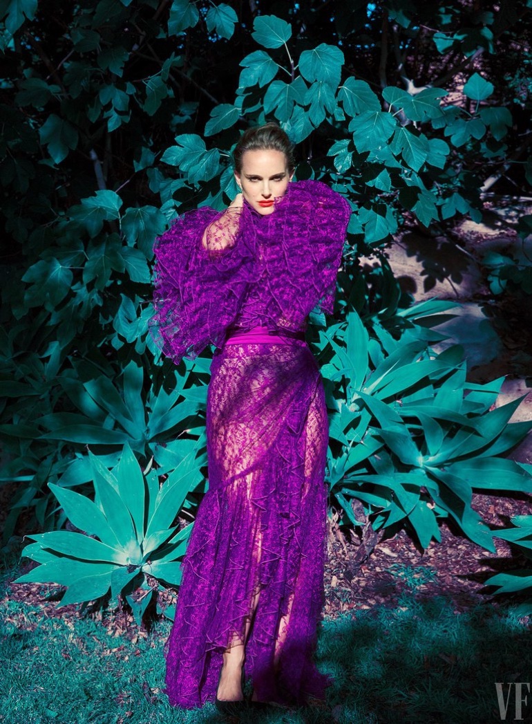 Actress Natalie Portman poses in a purple Rodarte dress