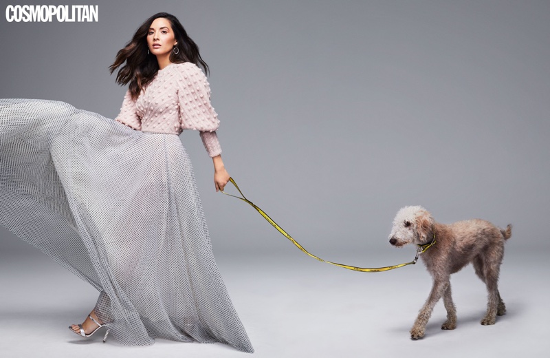 Actress Olivia Munn wears puffed sleeve sweater and tulle skirt