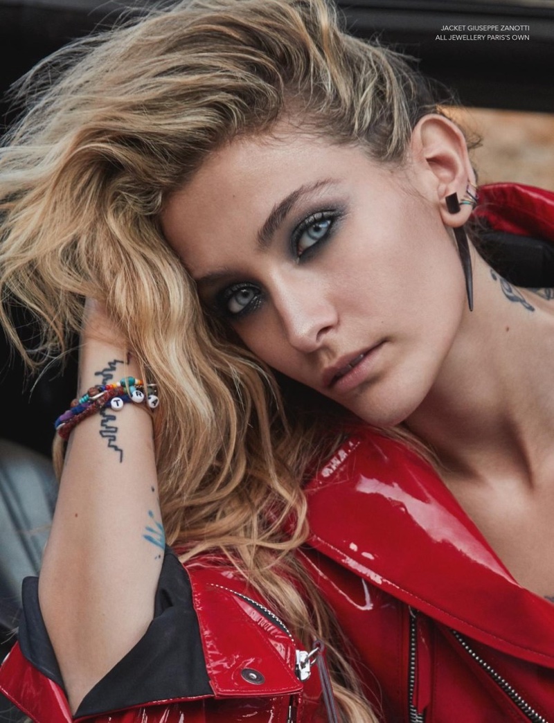 Photographed by David Roemer, Paris Jackson wears Giuseppe Zanotti jacket