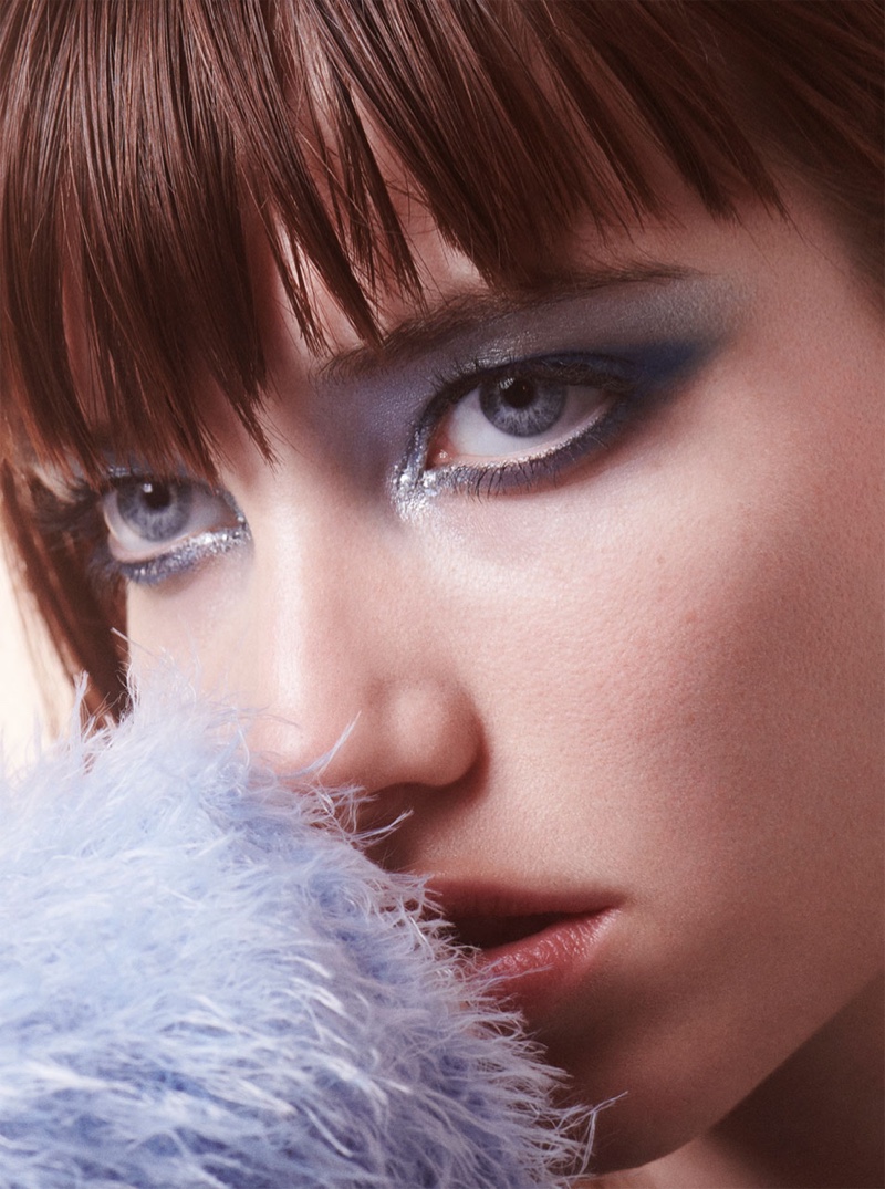 Grace Hartzel models a glittery eye makeup look